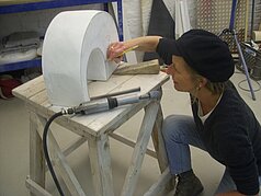 Sculptor Katrin Pfister-Rosenzweig with marble scultpure